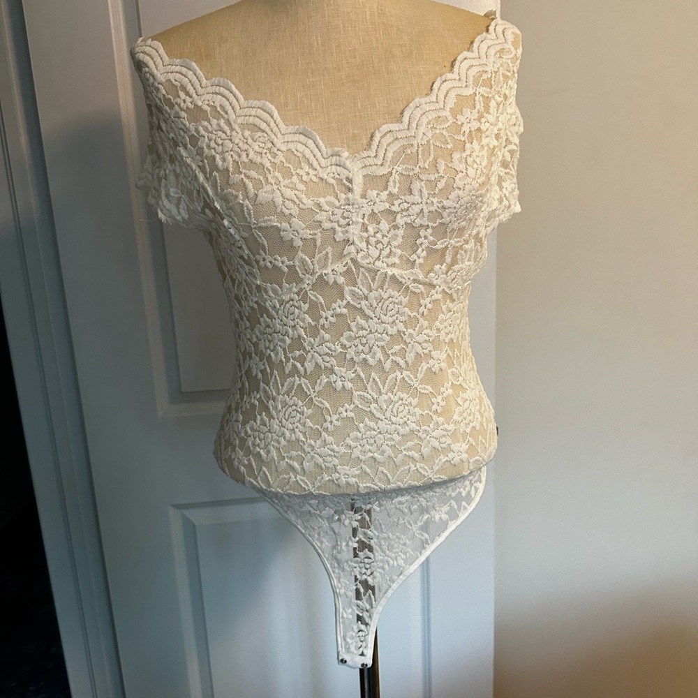 Chic Lace Bodysuit with Floral Design